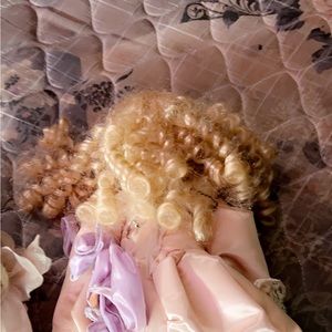 2 porcelain dolls for 1964. A baby and a big one. I don’t know much about them.